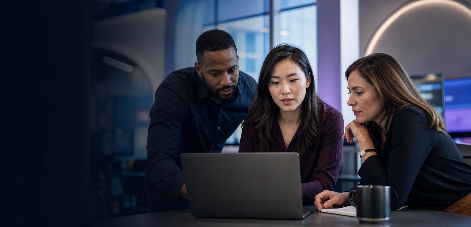 A group of traders reviewing market information together